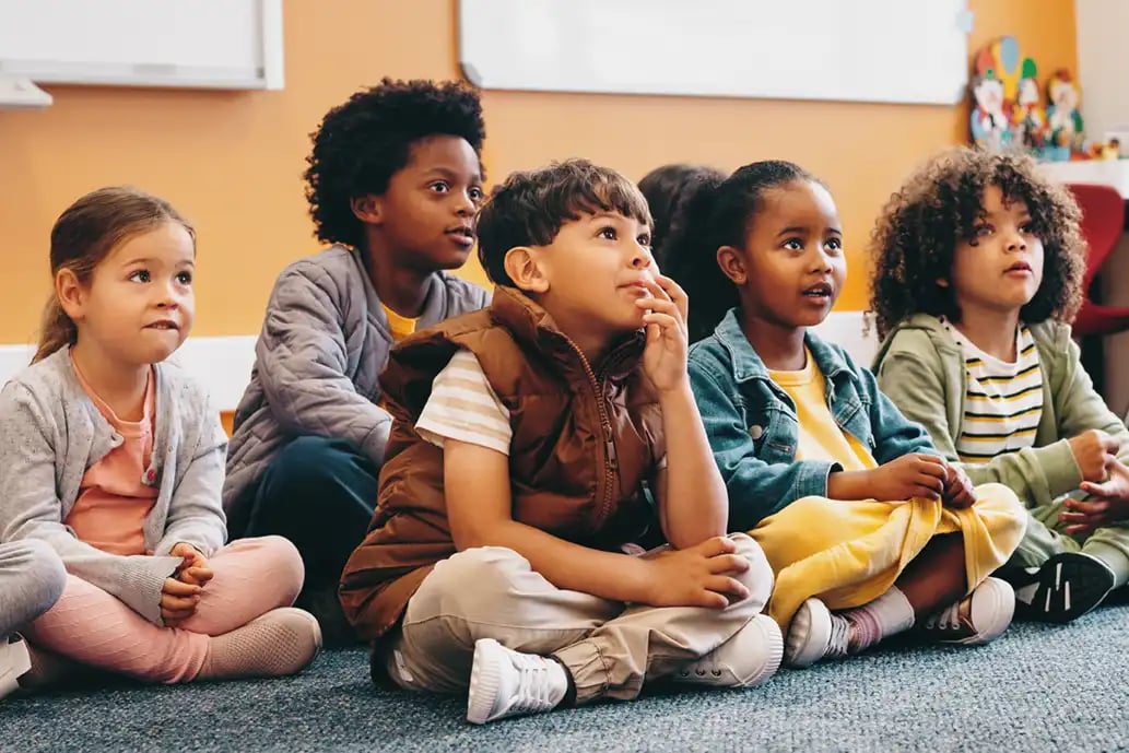 indigo-community-schools-kids-sitting-in-classroom